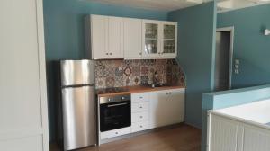 A kitchen or kitchenette at Porto Gavrio Loft