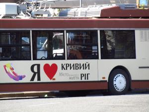 a bus with a sign on the side of it at Однокімнатна квартира подобово у центрі міста in Kryvyi Rih