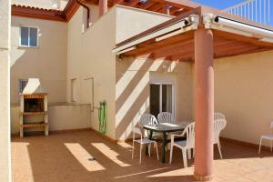 Balkón nebo terasa v ubytování Espectacular Ático con Parking y Terraza con BBQ