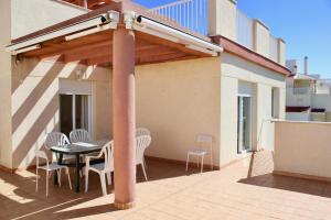 Balkón nebo terasa v ubytování Espectacular Ático con Parking y Terraza con BBQ