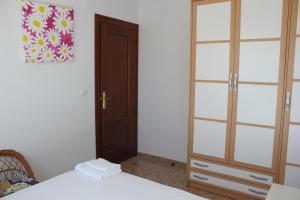 Postel nebo postele na pokoji v ubytování Espectacular Ático con Parking y Terraza con BBQ