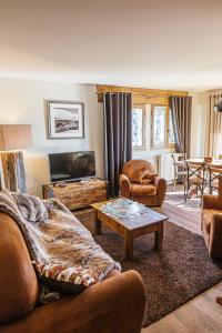 Khu vực ghế ngồi tại Chalet La Perle de L'Oisans - Appartements d'Exception