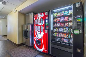 a coca cola vending machine in a building at Red Roof Inn PLUS + Phoenix West in Phoenix