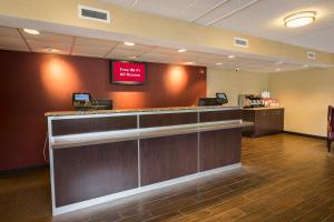 a waiting room with a cash counter in a hospital at Red Roof Inn PLUS+ West Springfield in Springfield