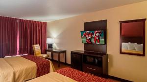 Postel nebo postele na pokoji v ubytování Red Roof Inn Lubbock