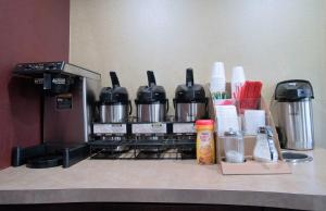 a coffee maker sitting on top of a counter at Red Roof Inn Kalamazoo West - Western Michigan U in Kalamazoo