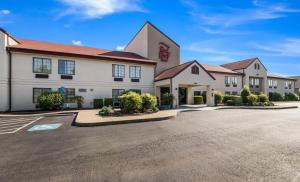 a rendering of the front of a hotel with a parking lot at Red Roof Inn Murfreesboro in Murfreesboro