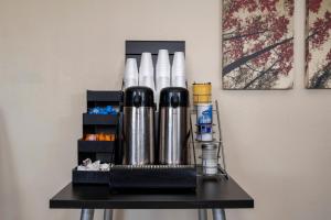 a table with a drink dispenser on top of it at Red Roof Inn Kenly - I-95 in Kenly