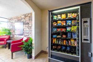 a refrigerator full of chips in a restaurant at Red Roof Inn Kenly - I-95 in Kenly