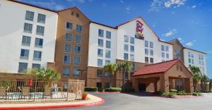 a rendering of the front of a hotel at Red Roof Inn PLUS+ San Antonio Downtown - Riverwalk in San Antonio