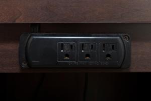 a black light switch on a wooden table at Red Roof Inn Wildwood – Cape May/Rio Grande in Rio Grande