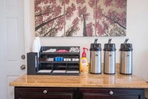 a kitchen counter with two heaters on a counter top at Red Roof Inn Wildwood – Cape May/Rio Grande in Rio Grande