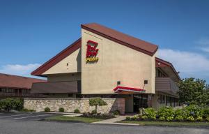 a building with a burger king sign on it at Red Roof Inn PLUS + Boston - Framingham in Framingham