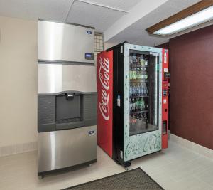 a coca cola vending machine in a room at Red Roof Inn PLUS + Boston - Framingham in Framingham