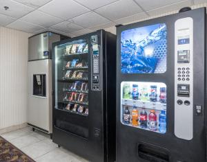 a black vending machine with drinks in it at Red Roof Inn Ames in Ames