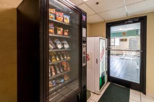 a refrigerator with food inside of a store at Red Roof Inn Morehead in Morehead +22 photos