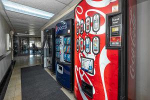 a row of vending machines in a building at Red Roof Inn Charlotte - University in Charlotte