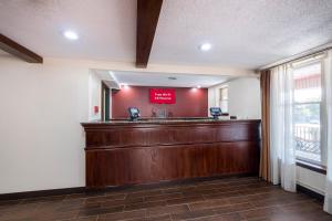 a waiting room with a cash counter in a hospital at Red Roof Inn & Suites Stafford in Stafford