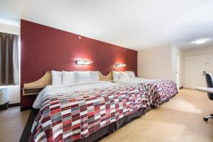 Postel nebo postele na pokoji v ubytování Red Roof Inn Laredo