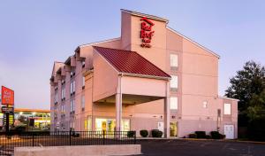 a rendering of the front of a hotel at Red Roof Inn & Suites Philadelphia - Bellmawr in Bellmawr