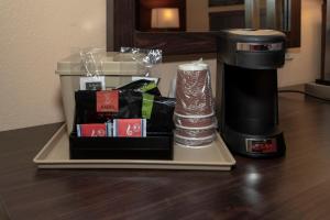 a coffee machine sitting on top of a table at Red Roof Inn Valdosta - University in Valdosta