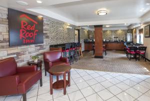 a restaurant with chairs and a red roof inn at Red Roof Inn Hartford - Vernon in Vernon