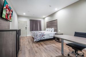 Postel nebo postele na pokoji v ubytování Red Roof Inn Baytown