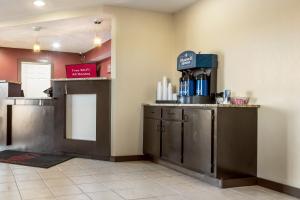 a coffee shop with a counter in a room at Red Roof Inn Anderson, IN in Anderson