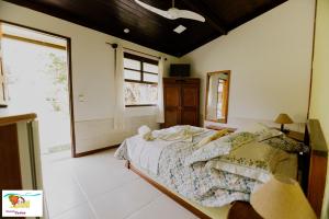 Cama ou camas em um quarto em Pousada Caúca
