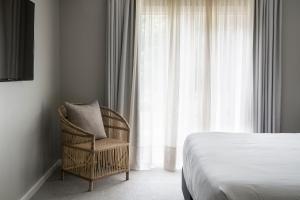 Lancemore Lindenderry Red Hill客房内的一张或多张床位