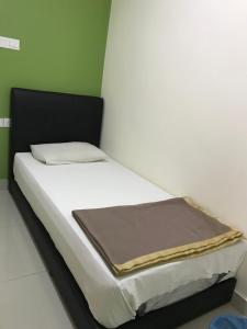 Postel nebo postele na pokoji v ubytování Hotel 3Winz, Chow Kit Hospital Kuala Lumpur