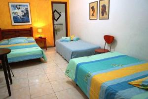 Postel nebo postele na pokoji v ubytování Hotel Faroazul RNT12633