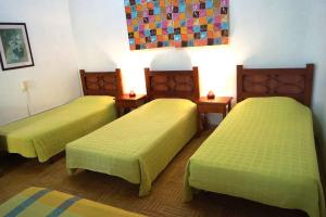 Postel nebo postele na pokoji v ubytování Hotel Faroazul RNT12633