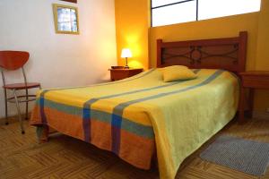 Postel nebo postele na pokoji v ubytování Hotel Faroazul RNT12633
