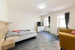 Televízia a/alebo spoločenská miestnosť v ubytovaní Apartsee Wellness Plzeň