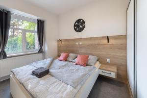Posteľ alebo postele v izbe v ubytovaní Apartsee Wellness Plzeň