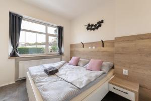 Posteľ alebo postele v izbe v ubytovaní Apartsee Wellness Plzeň