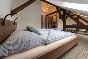 Posteľ alebo postele v izbe v ubytovaní Apartsee Wellness Plzeň