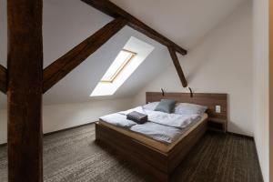 Posteľ alebo postele v izbe v ubytovaní Apartsee Wellness Plzeň