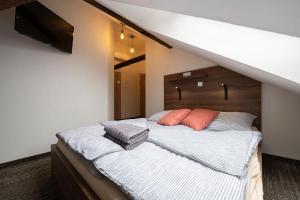 Posteľ alebo postele v izbe v ubytovaní Apartsee Wellness Plzeň