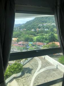 una vista desde una ventana de un camino en The Ceo Suites en Bayan Lepas