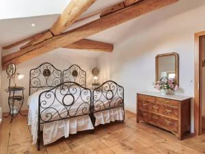 Un pat sau paturi într-o cameră la Palazzo