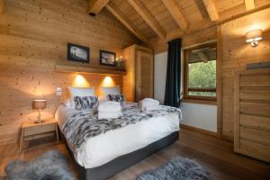 Un ou plusieurs lits dans un hébergement de l'établissement Whistler Lodge by Alpine Residences