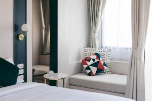 Posezení v ubytování Qlosest Hotel
