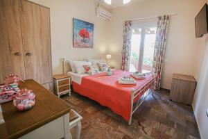 Postel nebo postele na pokoji v ubytování Navigator Villas - Houses