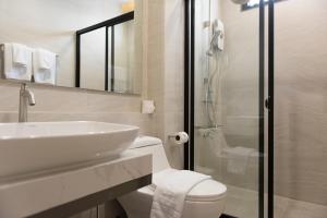 Koupelna v ubytování Qlosest Hotel