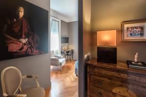 Televízia a/alebo spoločenská miestnosť v ubytovaní Pattini Guest House