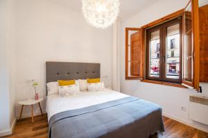 Postel nebo postele na pokoji v ubytování Apartamento en Plaza SEDASSOS Centro Historico