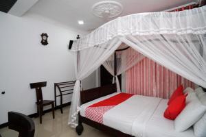 Shirantha Hotel客房内的一张或多张床位