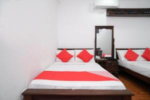 Shirantha Hotel客房内的一张或多张床位